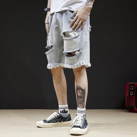 Shredded denim shorts