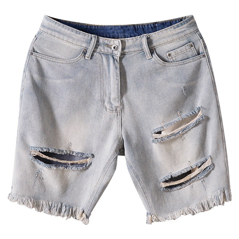 Shredded denim shorts